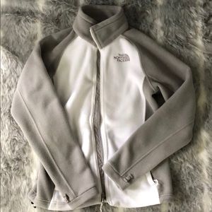 Gray and white north face fleece jacket